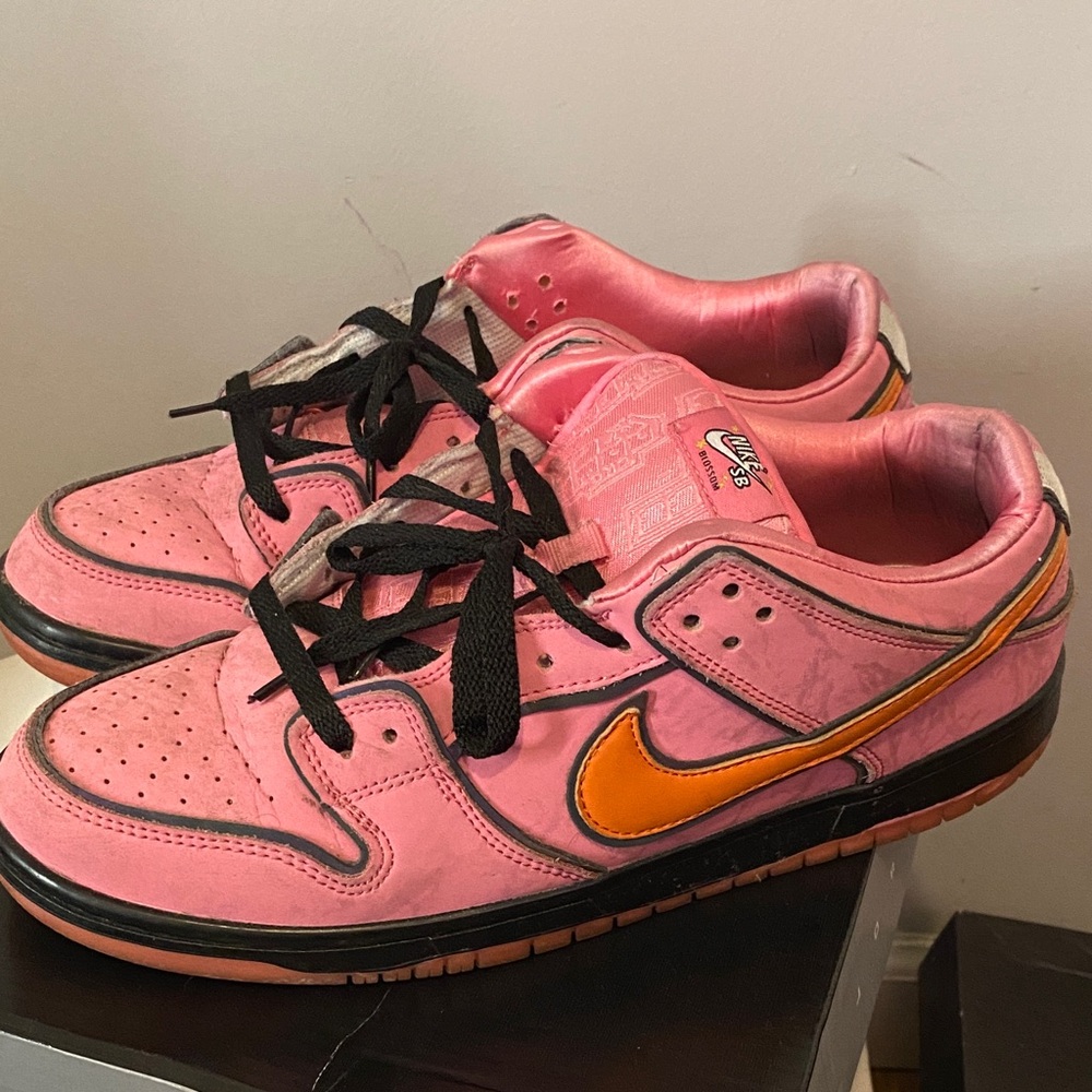 Nike Pink Sneakers with Orange Swoosh